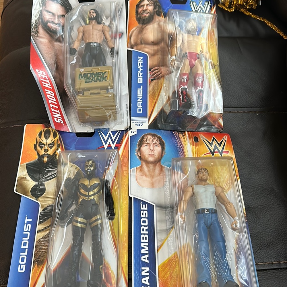 Lot of 4 WWE wrestlers Golddust, Dean Ambrose, Seth Rollins , Daniel Bryan